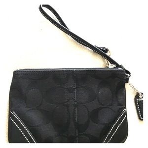 Hampton’s signature skinny wristlet